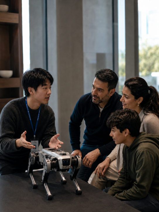 Family learning about robotics in China