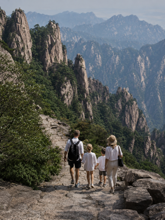A family hiking through the Chinese landscape